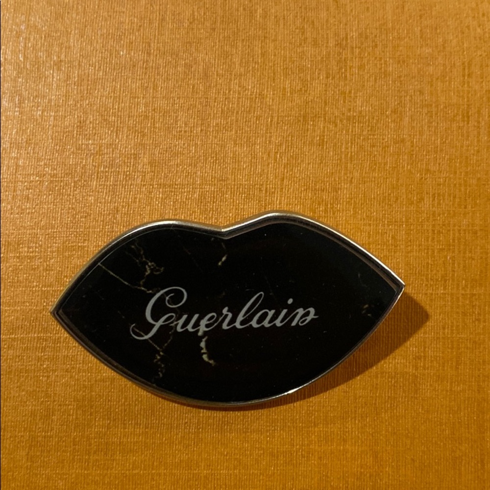 Guerlain pin